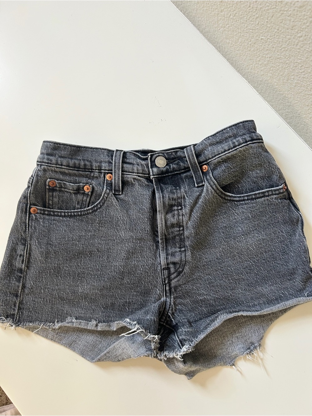 Black Levi’s Jean shorts- size 25